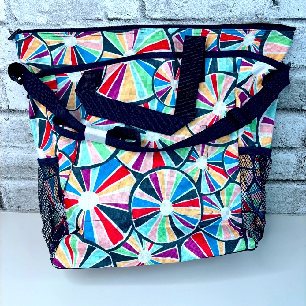 Thirty One Tote. Pockets on outside, plus mesh pockets good size. Cute Design